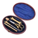 A gold mounted sewing set