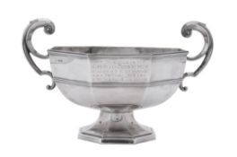A silver octagonal twin handled pedestal bowl by Walker & Hall
