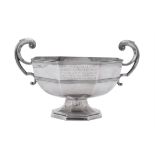 A silver octagonal twin handled pedestal bowl by Walker & Hall