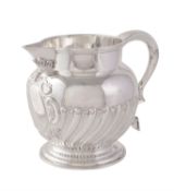 An Edwardian small silver water jug by Atkin Brothers