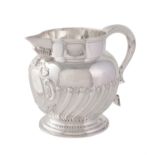 An Edwardian small silver water jug by Atkin Brothers