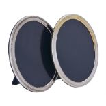 A matched pair of silver mounted oval photo frames by Carr's of Sheffield Ltd.