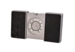 Y Asprey, a stainless steel and black alligator leather travel alarm desk clock