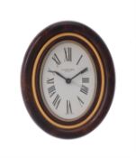 Cartier, a gilt metal and brown lacquer desk alarm clock