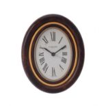 Cartier, a gilt metal and brown lacquer desk alarm clock