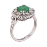 A French 1960s emerald and diamond cluster ring