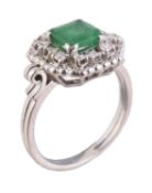 A French 1960s emerald and diamond cluster ring