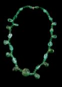 An emerald bead necklace