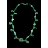 An emerald bead necklace