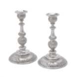 A pair of Austrian silver candlesticks