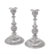 A pair of Austrian silver candlesticks