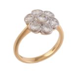 A diamond flower head cluster ring