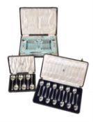 Y Three cased sets of flatware