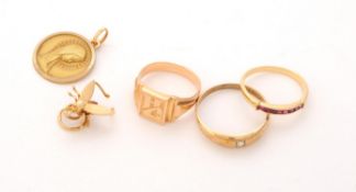 A small collection of gold coloured jewellery