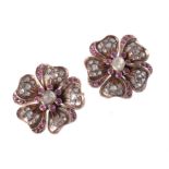 A pair of mid 20th century flower head brooches