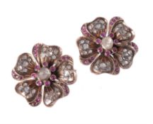 A pair of mid 20th century flower head brooches