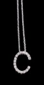 A diamond C pendant