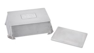 A silver rectangular cigarette box with canted corners by F. Burton Crosbee