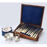 Y A cased set of twelve electro-plated and mother of pearl handled fruit knives and forks