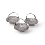 A set of three graduated silver and niello sweet baskets