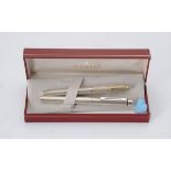 Sheaffer a silver coloured fountain pen with crosshatch decoration