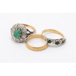 A 1970s 18 carta gold diamonds and emerald cluster ring