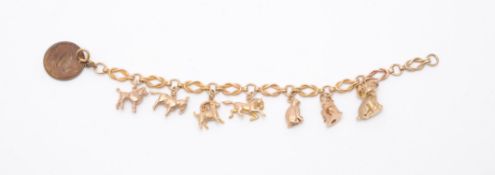 A 1960s 9 carat gold charm bracelet