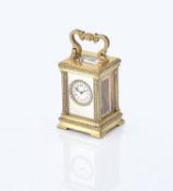 A brass and seed pearl miniature carriage clock