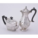 A Victorian silver baluster coffee pot by William Hutton & Sons Ltd.