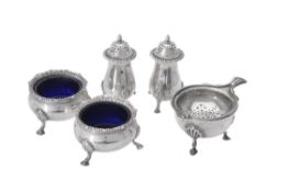 A pair of silver cauldron salts and pepperettes by Mappin & Webb