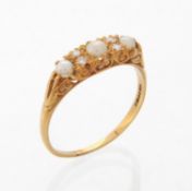 A cultured pearl and diamond ring