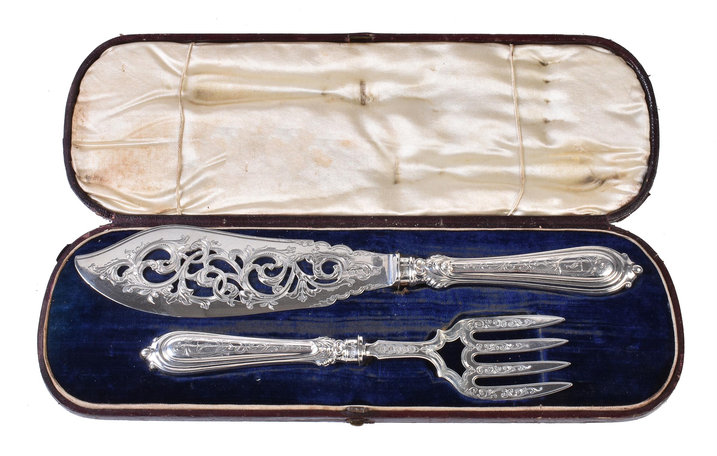 A pair of Victorian silver fish servers by John Gilbert