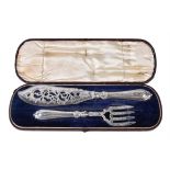 A pair of Victorian silver fish servers by John Gilbert