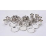 A set of six German silver coloured hammered drinking tots by Kleemann