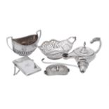 A collection of silver and silver coloured items