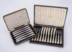 A cased set of six silver Albany pattern dessert knives and forks