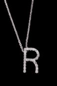 A diamond R pendant