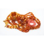 Two graduated polished amber bead necklaces