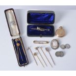 An early 20th century gold coloured fob watch and various gentleman's items