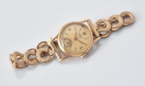 Norma, Gold coloured wrist watch