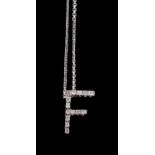 A diamond F pendant