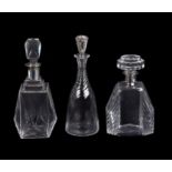 Three silver mounted decanters and stoppers