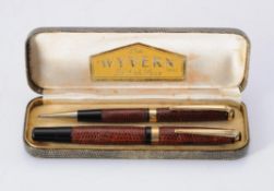 Y Wyvern, a lizard skin wrapped fountain pen and propelling pencil