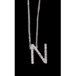 A diamond N pendant