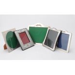 A collection of silver mounted photo frames
