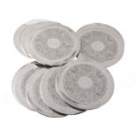 A matched set of ten silver mounted circular place mats