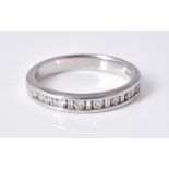 A diamond half eternity ring