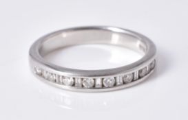 A diamond half eternity ring