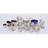 A collection of silver cruet items
