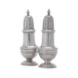 A pair of silver baluster casters by Barker Brothers Silver Ltd.
